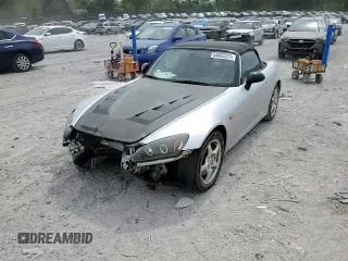 2002 Honda S2000 z VIN JHMAP11472T005753, wystawiony jako Copart lot #54002225 z przebiegiem 156 893 mil mil oraz Czysty tytuł • Clean title. Historia ofert i sprzedaży dostępna na DreamBid. Obrazek 14.