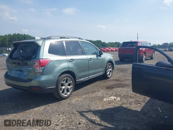 2017 Subaru Forester Touring with VIN JF2SJAWC8HH579492, listed as a IAAI auction lot 42571986 with 57,228 mi miles and . Bid and sale history available at DreamBid. Image 4.