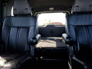 2015 Lincoln Navigator z VIN 5LMJJ3HT2FEJ12367, wystawiony jako Copart lot #56930865 z przebiegiem 71 415 mil mil oraz Szkody całkowita. Historia ofert i sprzedaży dostępna na DreamBid. Obrazek 10.