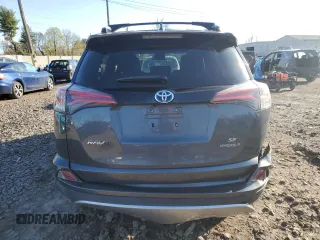 2018 Toyota RAV4 Hybrid SE with VIN JTMJJREV5JD210274, listed as a Copart auction lot 52450645 with 108,249 mi miles and Salvage title. Bid and sale history available at DreamBid. Image 6.