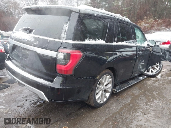 2019 Ford Expedition Platinum with VIN 1FMJU1MT5KEA25576, listed as a IAAI auction lot 40991021 with 44,446 mi miles. Bid and sale history available at carsss.com. Image 4.