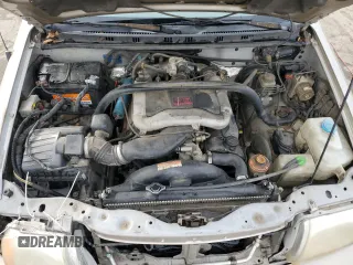 2002 Suzuki XL7 Standard z VIN JS3TX92V424130897, wystawiony jako Copart lot #84635434 z przebiegiem 208 447 mil mil oraz Szkoda całkowita • Salvage title. Historia ofert i sprzedaży dostępna na DreamBid. Obrazek 12.