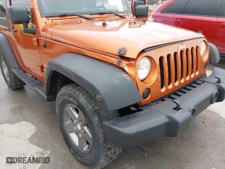 2011 Jeep Wrangler Sport with VIN 1J4AA2D16BL589390, listed as a IAAI auction lot 41478801 with 153,013 mi miles. Bid and sale history available at carsss.com. Image 6.