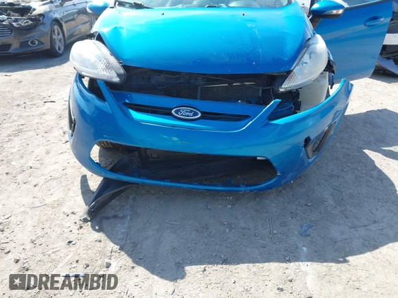 2013 Ford Fiesta SE with VIN 3FADP4EJ9DM158657, listed as a IAAI auction lot 42102761 with 170,845 mi miles and . Bid and sale history available at DreamBid. Image 6.