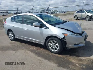 2010 Honda Insight EX with VIN JHMZE2H71AS017996, listed as a IAAI auction lot 42091356 with 142,474 mi miles and . Bid and sale history available at carsss.com. Image 1.