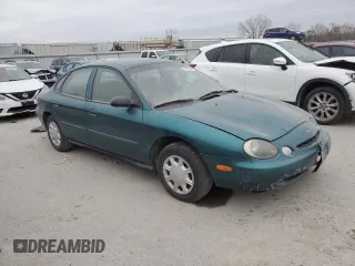 1997 Ford Taurus G with VIN 1FALP51U2VG299048, listed as a Copart auction lot 85742504 with 123,356 mi miles and Salvage Title. Bid and sale history available at carsss.com. Image 4.