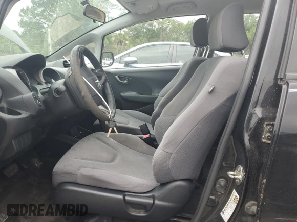 2009 Honda Fit with VIN JHMGE88249S068080, listed as a Copart auction lot 52469735 with 222,156 mi miles and Clean Title. Bid and sale history available at carsss.com. Image 7.