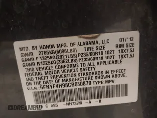 2012 Honda Pilot Touring with VIN 5FNYF4H98CB030879, listed as a IAAI auction lot 41619003 with 201,131 mi miles. Bid and sale history available at carsss.com. Image 9.