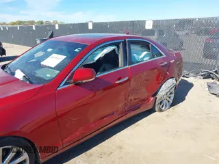 2014 Cadillac ATS Luxury AWD with VIN 1G6AH5RX0E0176647, listed as a IAAI auction lot 40939517 with 103,348 mi miles and . Bid and sale history available at DreamBid. Image 6.