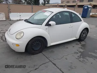 2003 Volkswagen New Beetle Coupe GL with VIN 3VWBK21C33M403802, listed as a IAAI auction lot 41484371 with 148,392 mi miles. Bid and sale history available at carsss.com. Image 2.