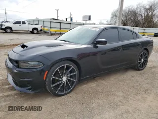 2019 Dodge Charger SXT with VIN 2C3CDXBG7KH599597, listed as a Copart auction lot 48837195 with 71,475 mi miles and Salvage Title. Bid and sale history available at carsss.com. Image 1.