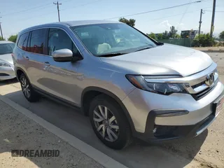 2022 Honda Pilot EX-L with VIN 5FNYF5H51NB036965, listed as a Copart auction lot 55627995 with 20,181 mi miles and Salvage title. Bid and sale history available at DreamBid. Image 1.