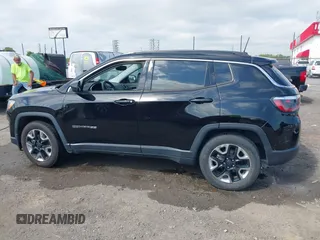 2021 Jeep Compass Altitude with VIN 3C4NJCBB0MT502423, listed as a IAAI auction lot 42006742 with 63,418 mi miles. Bid and sale history available at carsss.com. Image 14.