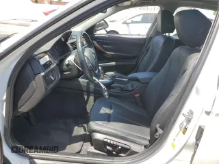 2015 BMW 3 Series 328i with VIN WBA3C1C56FK122177, listed as a Copart auction lot 57333625 with 102,399 mi miles and Salvage title. Bid and sale history available at DreamBid. Image 7.