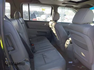 2011 Honda Pilot EX-L with VIN 5FNYF4H69BB051972, listed as a IAAI auction lot 41365646 with 228,123 mi miles and . Bid and sale history available at carsss.com. Image 8.