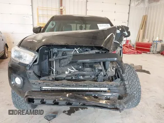 2017 Toyota Tacoma SR5 with VIN 5TFCZ5AN0HX053441, listed as a IAAI auction lot 42376148 with 100,996 mi miles and . Bid and sale history available at DreamBid. Image 6.
