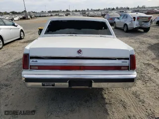 1988 Lincoln Town Car with VIN 1LNBM81F5JY730676, listed as a Copart auction lot 74849694 with 0 mi miles and Non Repairable. Bid and sale history available at carsss.com. Image 6.