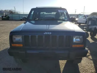 2001 Jeep Cherokee Sport with VIN 1J4FF48S61L617340, listed as a Copart auction lot 52340995 with 210,256 mi miles and Clean Title. Bid and sale history available at carsss.com. Image 5.