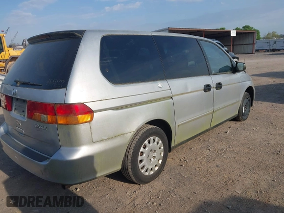 2002 Honda Odyssey LX z VIN 2HKRL18522H534580, wystawiony jako IAAI lot #41958266 z przebiegiem 176 441 mil mil oraz . Historia ofert i sprzedaży dostępna na DreamBid. Obrazek 4.