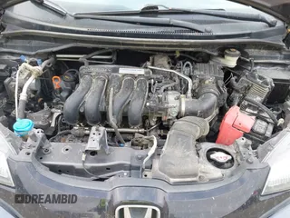 2015 Honda Fit LX with VIN 3HGGK5H58FM722880, listed as a IAAI auction lot 42276261 with 104,886 mi miles and . Bid and sale history available at DreamBid. Image 10.