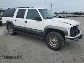 1999 GMC Suburban with VIN 1GKGK26JXXJ766542, listed as a Copart auction lot 47658715 with 260,167 mi miles and Clean Title. Bid and sale history available at carsss.com. Image 4.