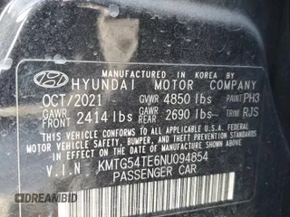 2022 Genesis G70 3.3T z VIN KMTG54TE6NU094854, wystawiony jako Copart lot #80251854 z przebiegiem Nie podano mil oraz Szkoda całkowita • Salvage title. Historia ofert i sprzedaży dostępna na DreamBid. Obrazek 12.