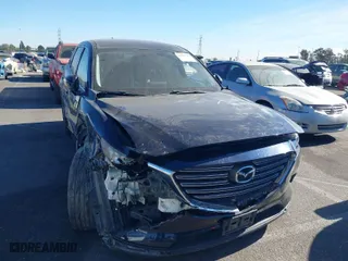 2016 Mazda CX-9 Touring with VIN JM3TCACY1G0102100, listed as a IAAI auction lot 41383584 with 174,501 mi miles. Bid and sale history available at carsss.com. Image 1.
