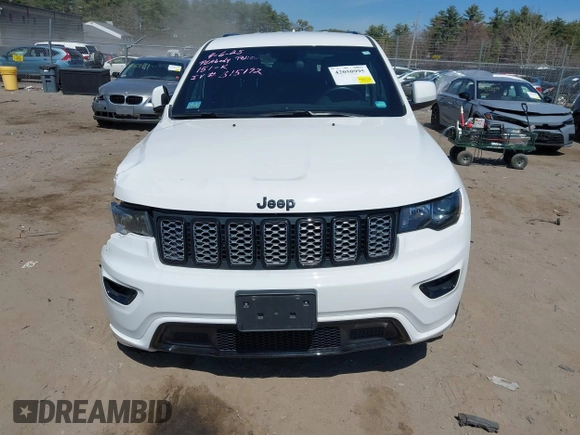 2021 Jeep Grand Cherokee Freedom with VIN 1C4RJFAG0MC856308, listed as a IAAI auction lot 42050995 with 35,428 mi miles and . Bid and sale history available at DreamBid. Image 13.
