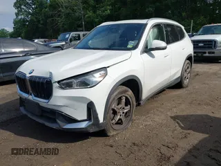 2023 BMW X1 xDrive28i with VIN WBX73EF03P5X21780, listed as a IAAI auction lot 42366909 with 14,673 mi miles and . Bid and sale history available at DreamBid. Image 2.