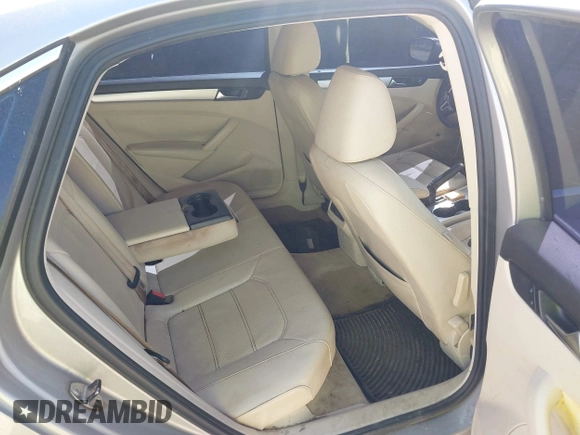 2013 Volkswagen Passat SE w/Sunroof with VIN 1VWBH7A35DC118355, listed as a IAAI auction lot 41835236 with 228,358 mi miles. Bid and sale history available at carsss.com. Image 8.