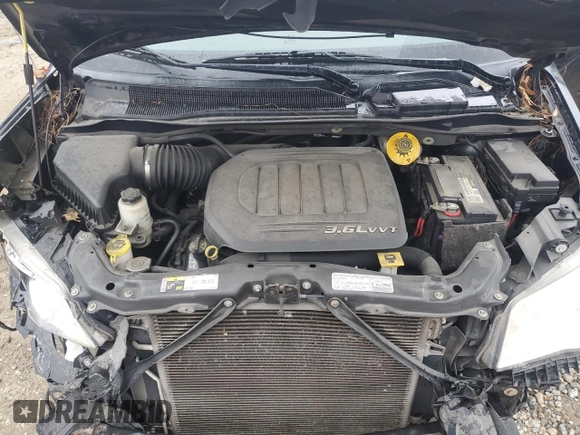 2013 Chrysler Town & Country Touring L with VIN 2C4RC1CGXDR781456, listed as a Copart auction lot 46633675 with 112,354 mi miles and Clean Title. Bid and sale history available at DreamBid. Image 12.