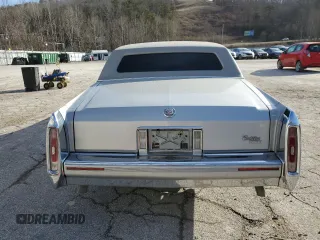 1990 Cadillac Brougham z VIN 1G6DW5476LR721785, wystawiony jako Copart lot #47170405 z przebiegiem Nie podano mil oraz Szkody całkowita. Historia ofert i sprzedaży dostępna na DreamBid. Obrazek 6.