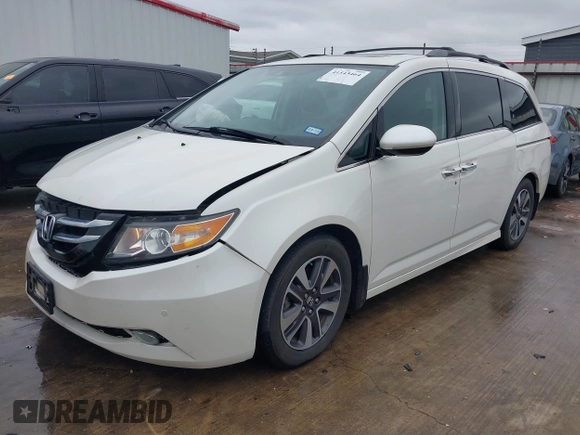 2016 Honda Odyssey Touring Elite with VIN 5FNRL5H9XGB100116, listed as a IAAI auction lot 41543464 with 160,763 mi miles and . Bid and sale history available at DreamBid. Image 2.