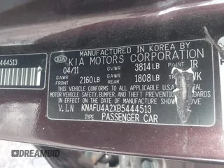 2011 Kia Forte EX with VIN KNAFU4A2XB5444513, listed as a IAAI auction lot 42002807 with 233,408 mi miles. Bid and sale history available at carsss.com. Image 9.