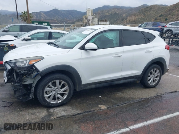 2019 Hyundai Tucson SE with VIN KM8J23A48KU026984, listed as a IAAI auction lot 41767118 with 72,647 mi miles. Bid and sale history available at carsss.com. Image 15.