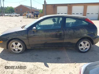 2006 Ford Focus S z VIN 1FAFP31N76W249134, wystawiony jako IAAI lot #41951073 z przebiegiem 152 065 mil mil oraz . Historia ofert i sprzedaży dostępna na DreamBid. Obrazek 14.