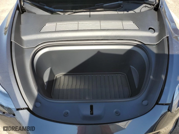 2025 Tesla Model Y Long Range with VIN 7SAYGDEE9SF302274, listed as a Copart auction lot 46942325 with 238 mi miles and Salvage Title. Bid and sale history available at carsss.com. Image 12.