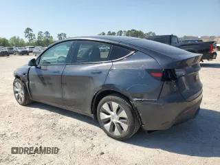 2024 Tesla Model Y Long Range with VIN 7SAYGDEE5RA282984, listed as a Copart auction lot 52388455 with 11,922 mi miles and Salvage Title. Bid and sale history available at DreamBid. Image 2.