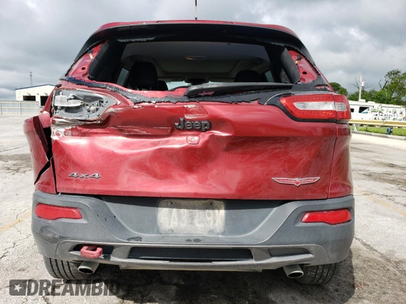 2014 Jeep Cherokee Trailhawk z VIN 1C4PJMBS2EW100476, wystawiony jako Copart lot #55130035 z przebiegiem 136 943 mil mil oraz Szkoda całkowita • Salvage title. Historia ofert i sprzedaży dostępna na DreamBid. Obrazek 6.