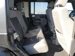 2010 Jeep Wrangler Unlimited Sahara with VIN 1J4BA5H17AL123479, listed as a Copart auction lot 49066315 with 114,419 mi miles and Salvage Title. Bid and sale history available at carsss.com. Image 11.
