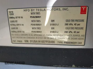 2014 Tesla Model S 60 z VIN 5YJSA1H16EFP28486, wystawiony jako IAAI lot #41887484 z przebiegiem 99 271 mil mil oraz . Historia ofert i sprzedaży dostępna na DreamBid. Obrazek 9.