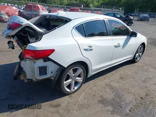 2014 Acura ILX Premium with VIN 19VDE1F53EE002442, listed as a IAAI auction lot 42400917 with 135,525 mi miles and . Bid and sale history available at DreamBid. Image 4.