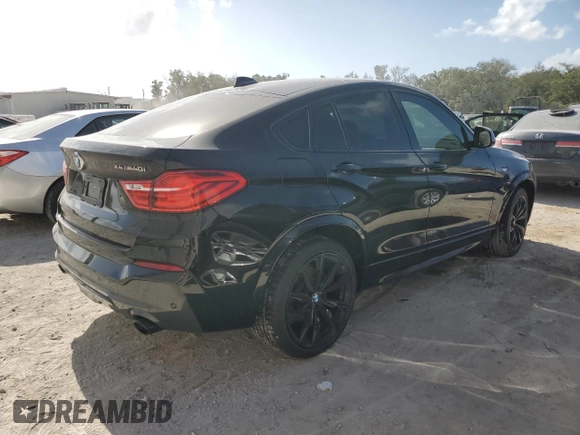 2017 BMW X4 M40i with VIN 5UXXW7C51H0U25766, listed as a Copart auction lot 77749324 with 101,289 mi miles and Salvage Title. Bid and sale history available at carsss.com. Image 3.