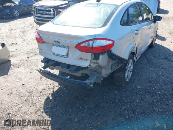 2016 Ford Fiesta SE with VIN 3FADP4BJ7GM110714, listed as a IAAI auction lot 41989876 with Not Provided miles and . Bid and sale history available at DreamBid. Image 6.