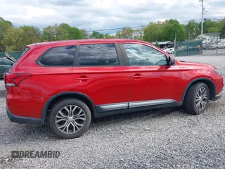 2016 Mitsubishi Outlander SE z VIN JA4AZ3A36GZ037753, wystawiony jako IAAI lot #42215227 z przebiegiem 71 135 mil mil oraz . Historia ofert i sprzedaży dostępna na DreamBid. Obrazek 13.