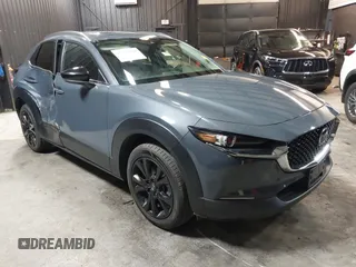 2022 Mazda CX-30 S Carbon Edition with VIN 3MVDMBCL8NM447234, listed as a IAAI auction lot 42511600 with 51,926 mi miles and . Bid and sale history available at DreamBid. Image 1.