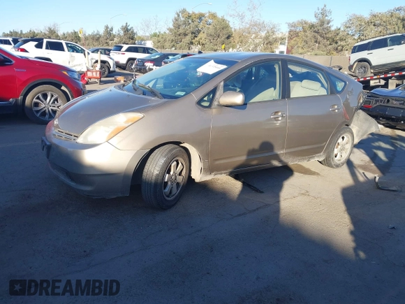 2005 Toyota Prius with VIN JTDKB20U453040279, listed as a IAAI auction lot 41335444 with 204,689 mi miles and . Bid and sale history available at DreamBid. Image 2.