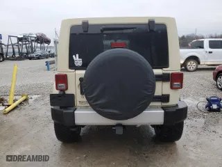 2011 Jeep Wrangler Unlimited Sahara with VIN 1J4BA5H19BL562457, listed as a Copart auction lot 44646965 with 184,155 mi miles and Salvage Title. Bid and sale history available at carsss.com. Image 6.