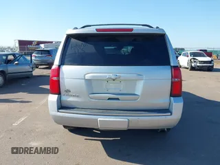 2015 Chevrolet Tahoe LTZ with VIN 1GNSKCKC5FR205739, listed as a IAAI auction lot 40020644 with 142,524 mi miles and . Bid and sale history available at DreamBid. Image 16.