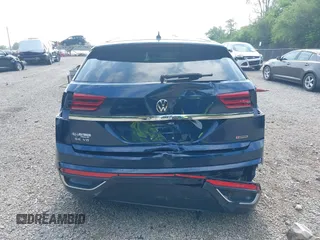 2022 Volkswagen Atlas SE z VIN 1V2HE2CA7NC211835, wystawiony jako IAAI lot #42722660 z przebiegiem 56 112 mil mil oraz . Historia ofert i sprzedaży dostępna na DreamBid. Obrazek 17.